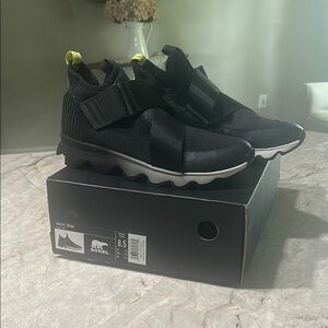 Sorel Black Kinetic Sneakers with Yellow Accents